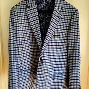 Worn 2 times. Purchased before Covid. Nautical plaid blue sports coat.